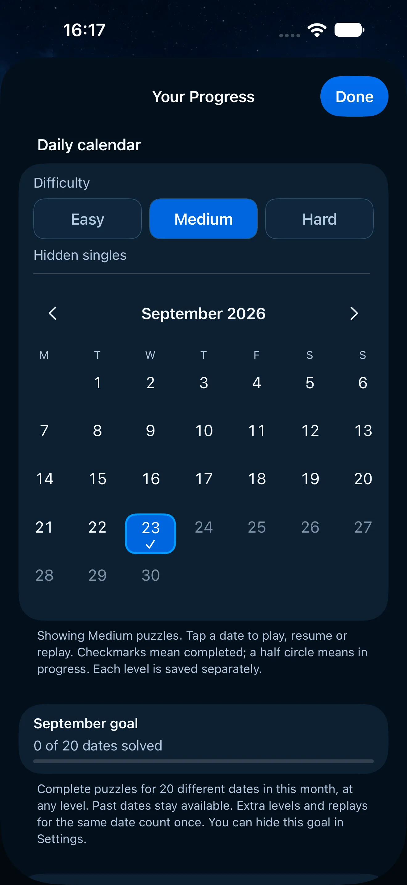The same calendar and monthly goal in the dark theme, on a deep blue background.
