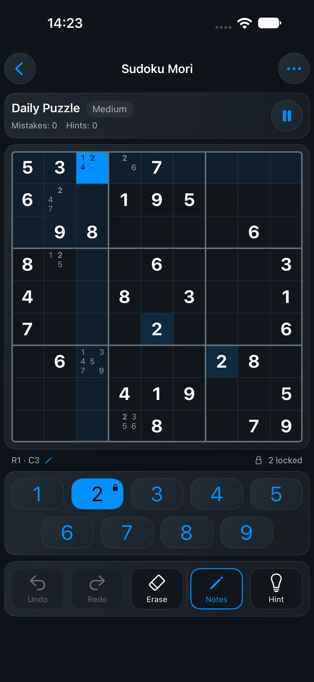 The same puzzle and controls in the dark theme, the blue highlight reading brighter against the near-black board.