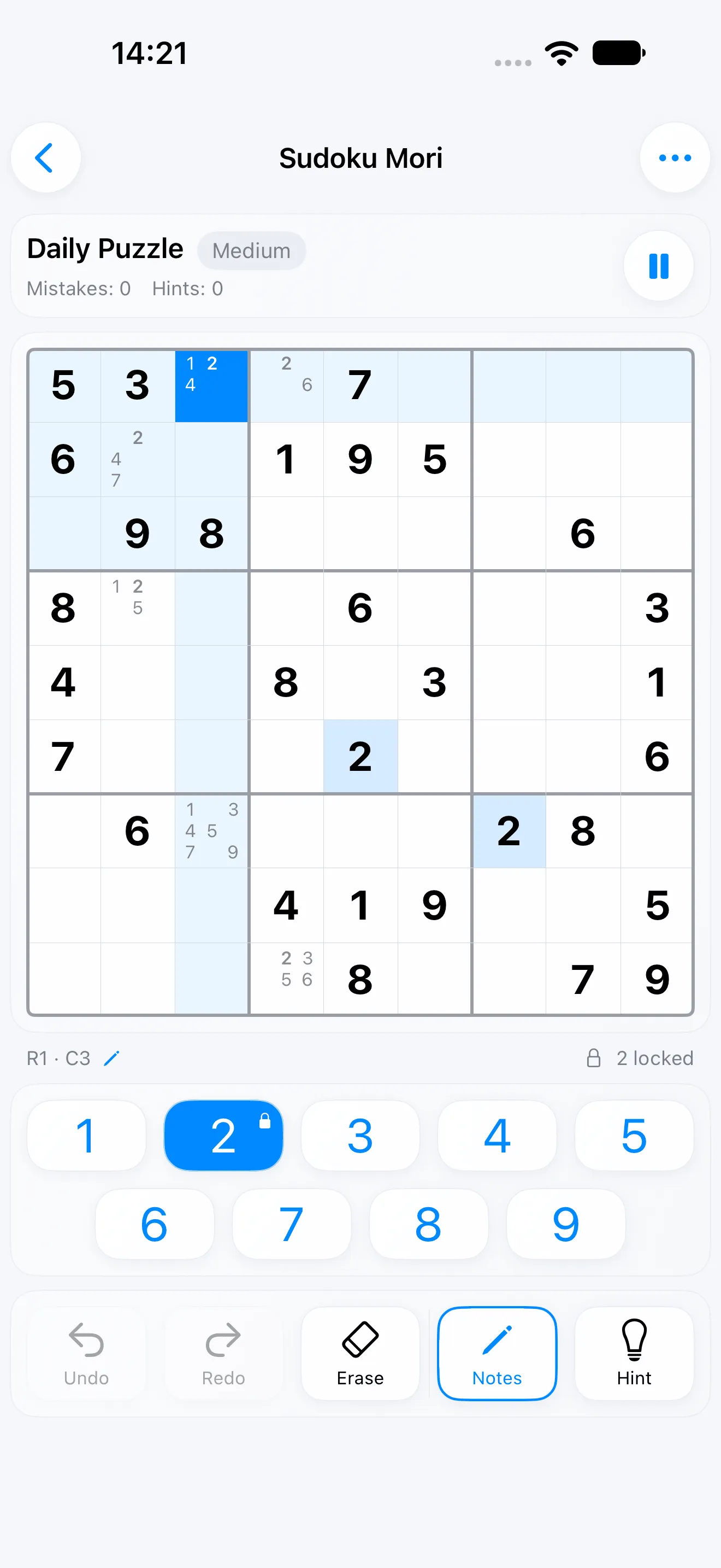 A medium daily puzzle in the light theme, with two pencilled cells, the selected square highlighted in blue and 2 locked in the keypad.