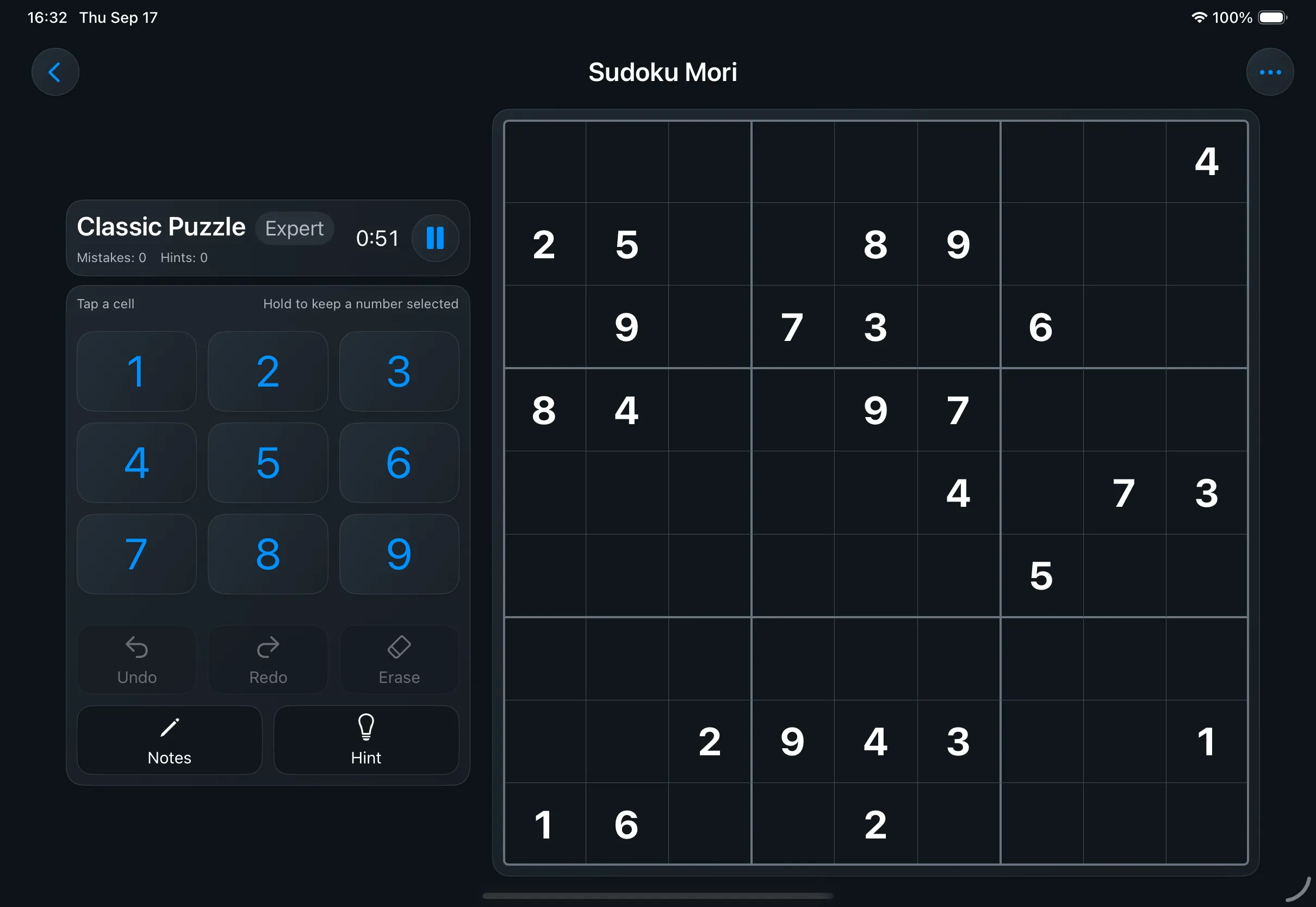 The same left-handed iPad layout in the dark theme, board and controls on a near-black background.