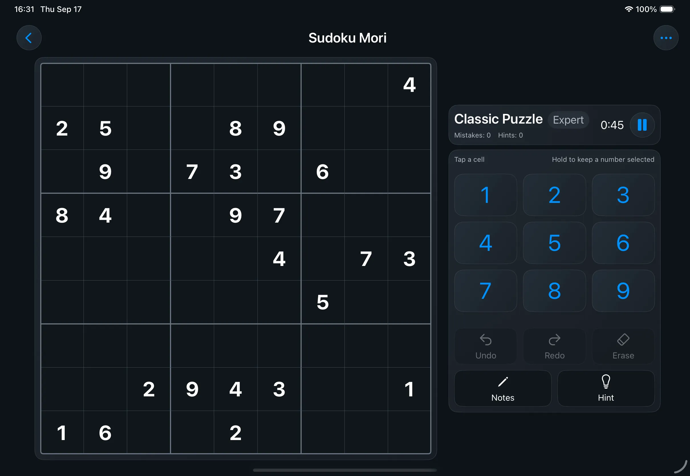 The right-handed iPad layout in the dark theme, board and controls on a near-black background.